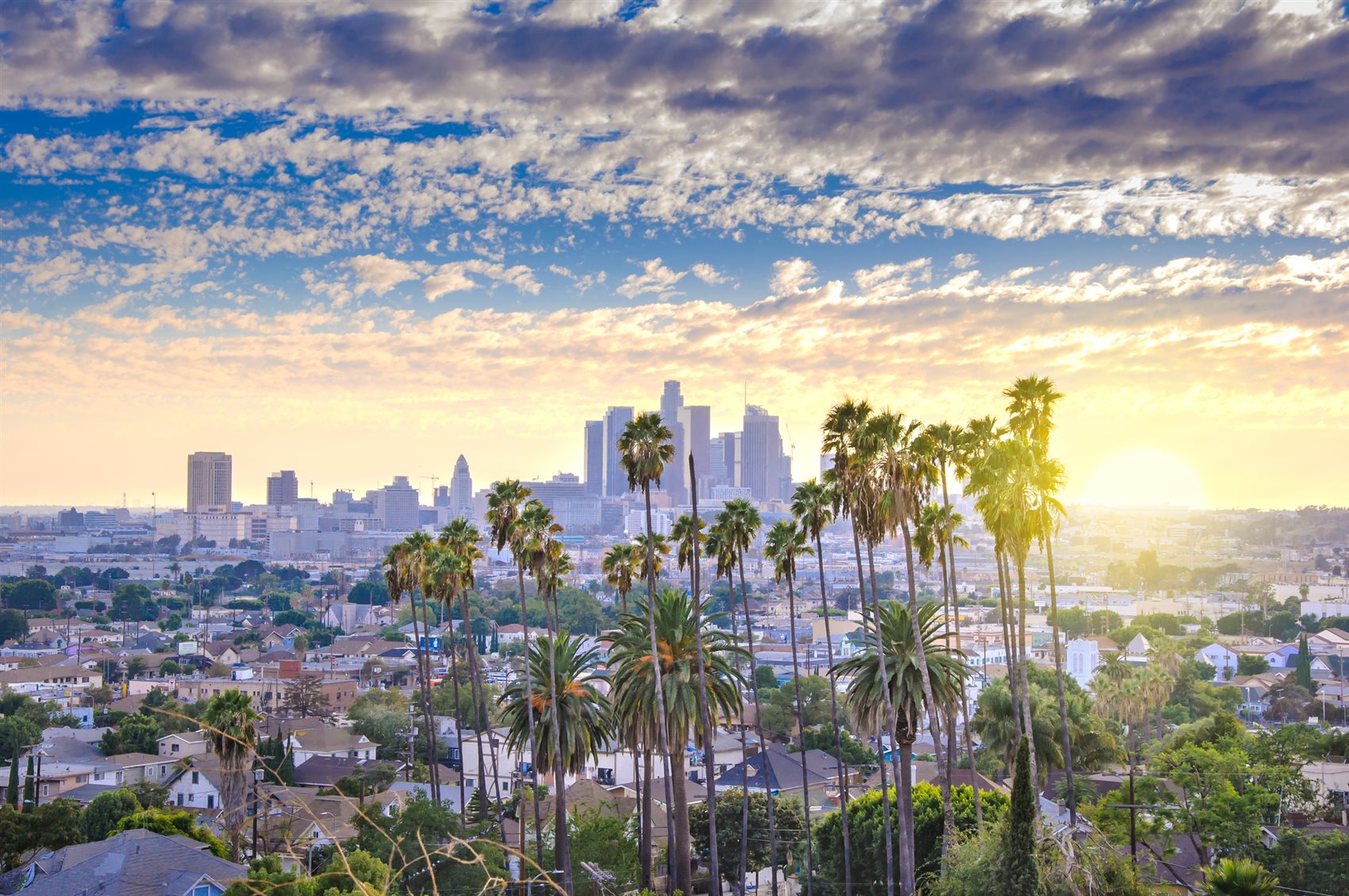 2028 Summer Games Travel Packages Downtown Los Angeles skyline at sunset